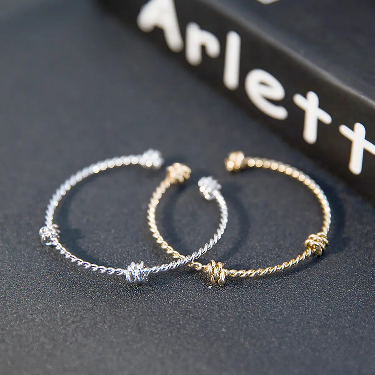 Three knotted opening bracelets null