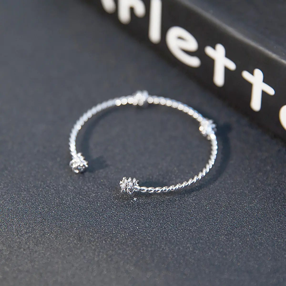 Three knotted opening bracelets null