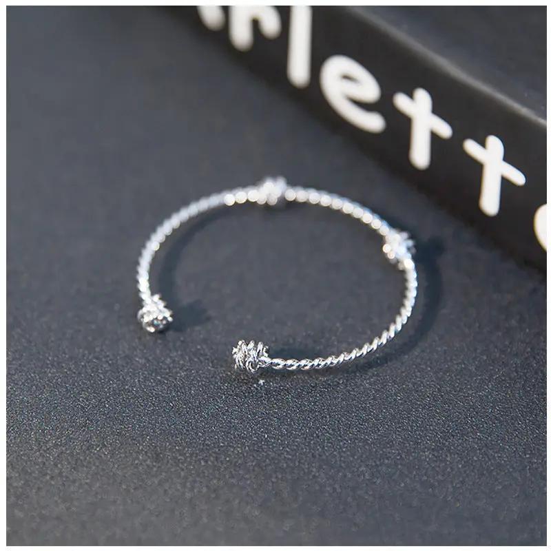 Three knotted opening bracelets null