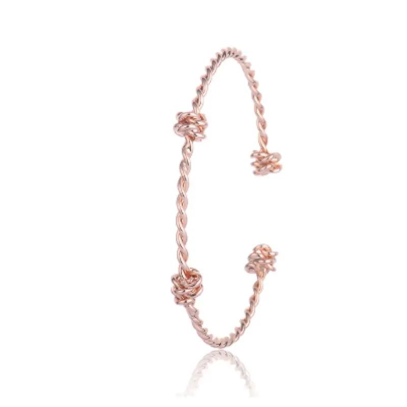 Three knotted opening bracelets null