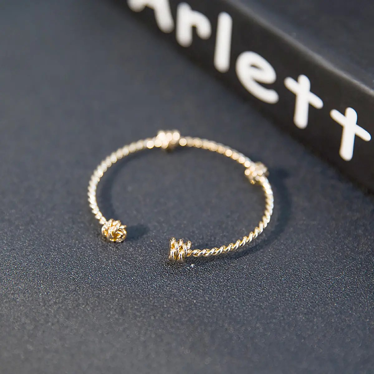 Three knotted opening bracelets null